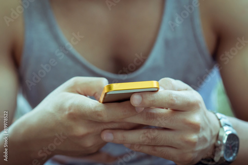 lifestyle young man using a mobile phone with texting message
