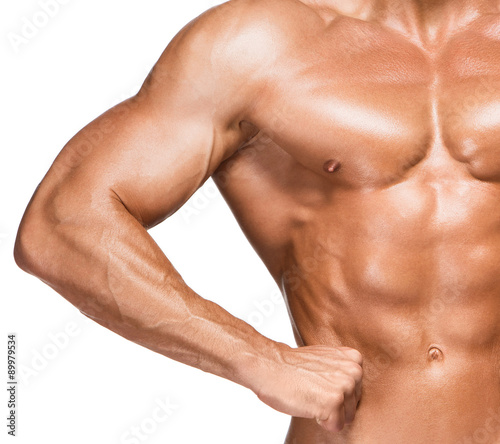 Torso of male body builder on white background