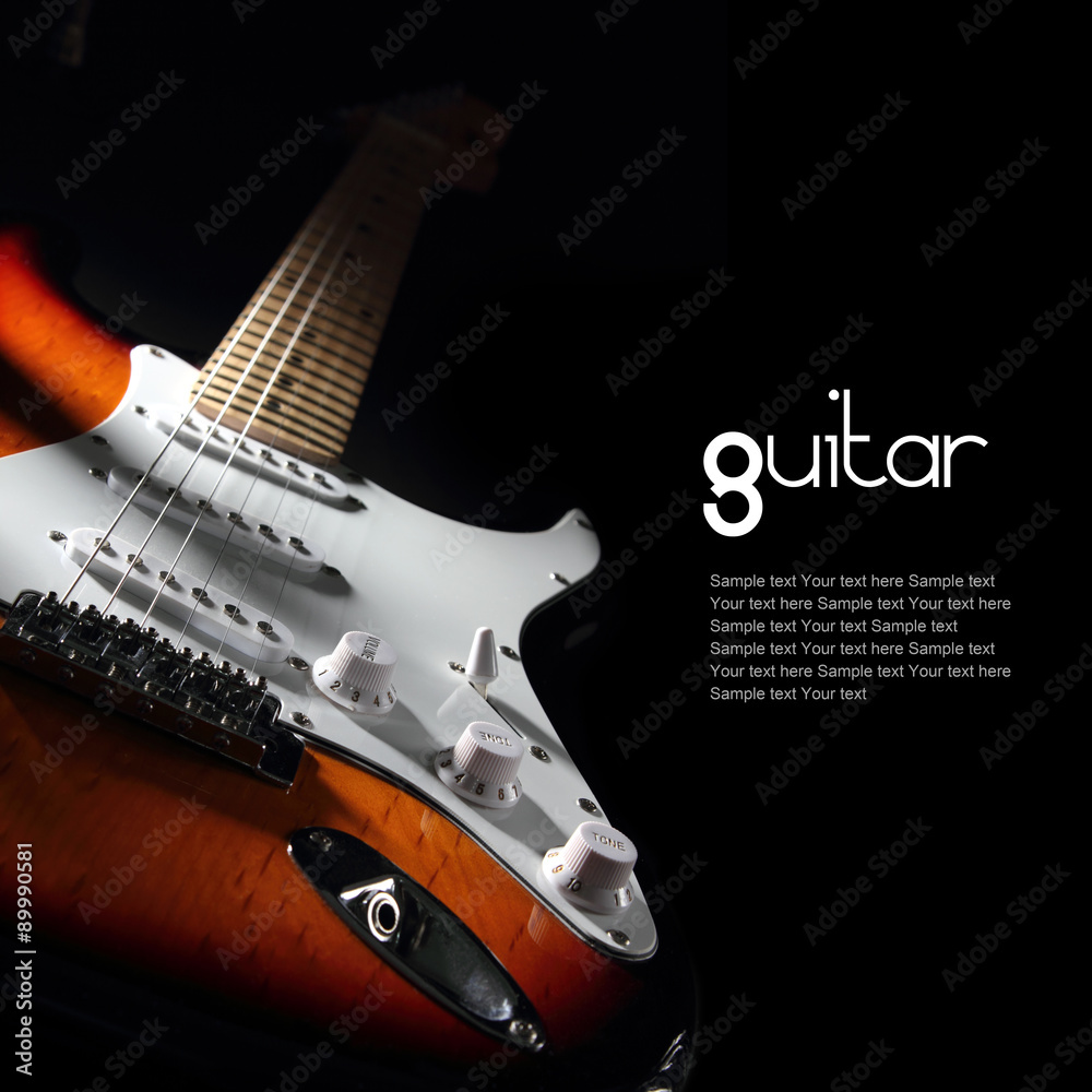 Obraz premium Electric guitar on dark background. Removable sample text.