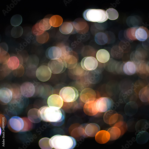 Abstract festive background with bokeh defocused lights