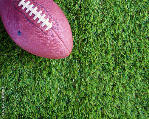 Vintage football over grass