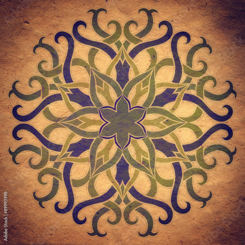Flower Mandala with old paper background. Ornamental round floral Pattern.