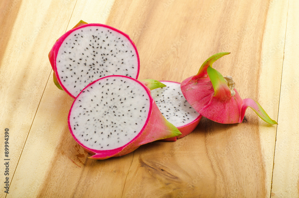 Dragon fruit on wood background Dragon fruit on wood background