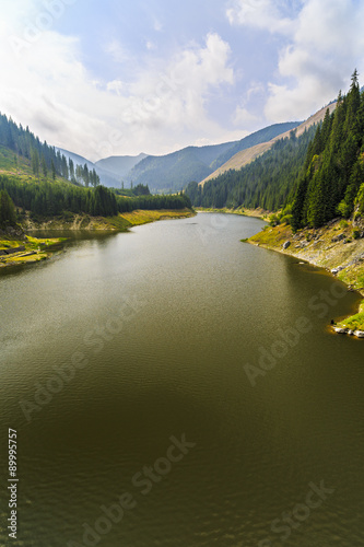 Landscape with Petrimanu Lake in Romanian mountains photo