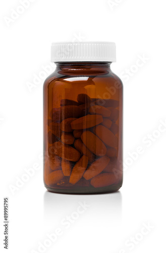 brown glass bottle for supplement product isolated on white back