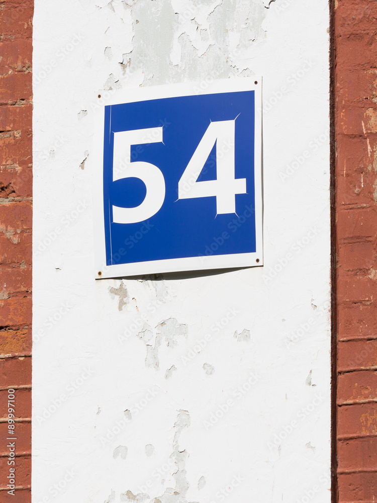 Obraz premium number 54 on the blue plate