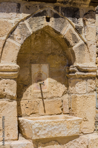 Medieval faucet in Larnaca Fort photo