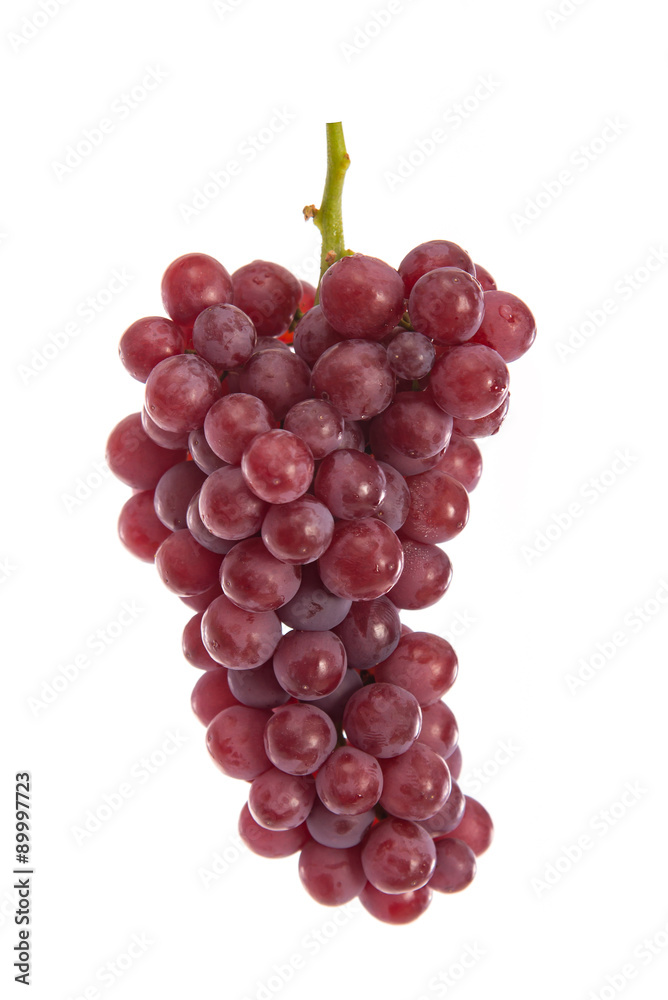 Fresh red grapes on white Fresh red grapes on white