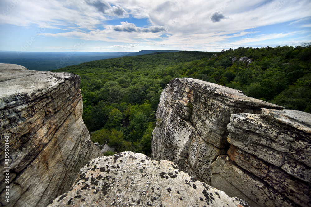 Massive rocks and view to the valley at Minnewaska State Park Reserve Upstate NY during summer time