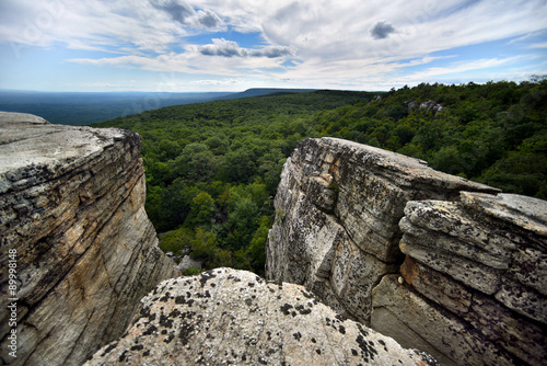 Massive rocks and view to the valley at Minnewaska State Park Reserve Upstate NY during summer time