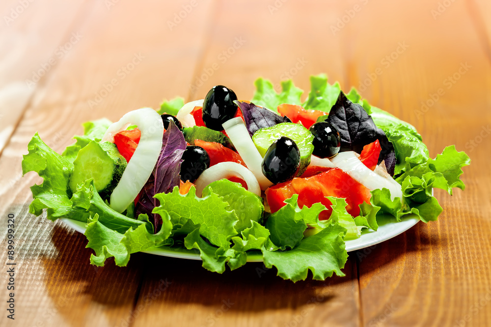 Fresh vegetable salad on table Fresh vegetable salad on table