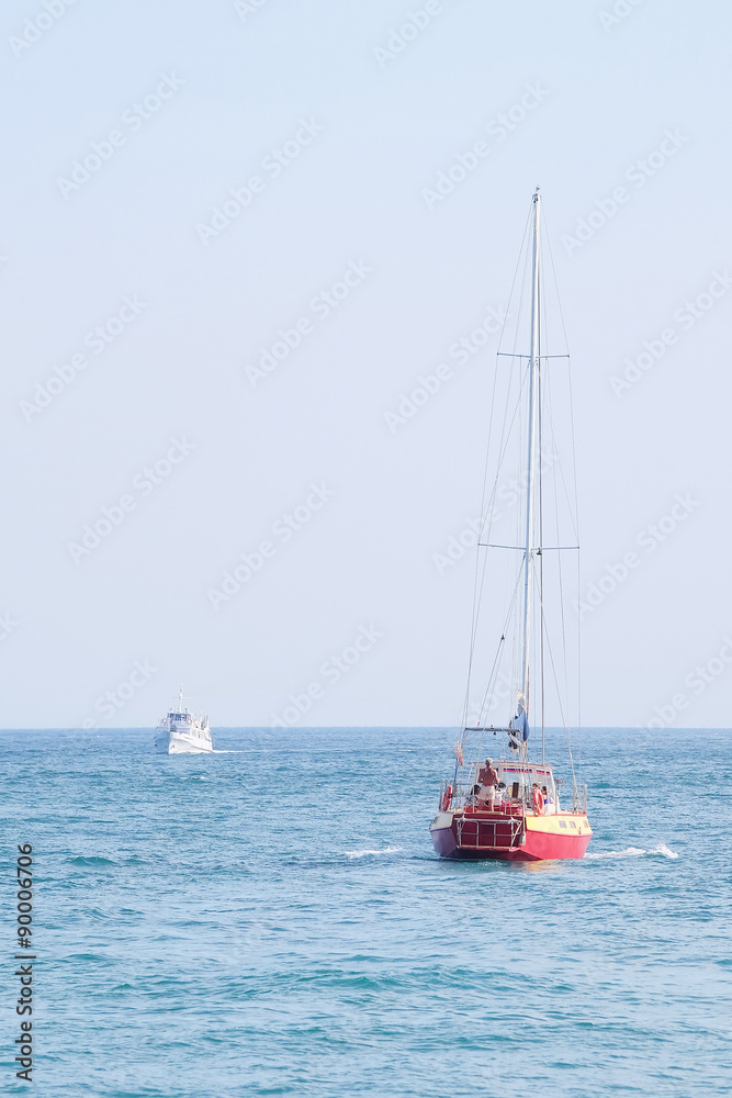 The image of sailer in the sea