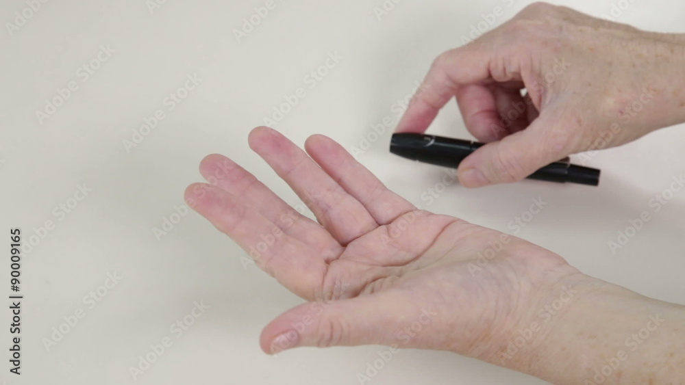 Senior hands pricking finger in blood sugar level test
Senior hands pricking finger in blood sugar level test