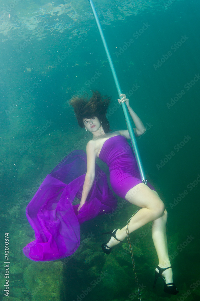 Underwater striptease