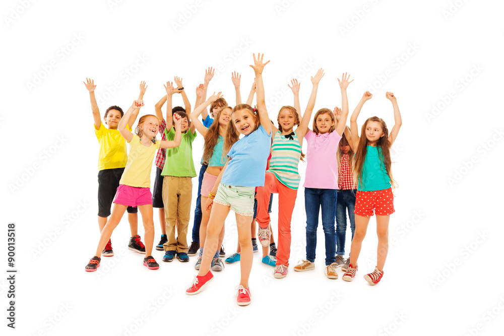 Fototapeta premium Many happy kids cheer and rise hands