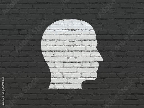 Business concept: Head on wall background