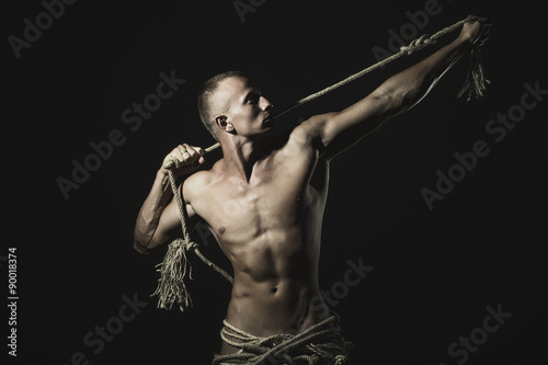 Man holding rope © Volodymyr