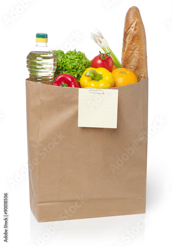 Shopping list on a bag of groceries