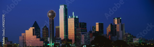 This is the skyline at dusk. It shows the Reunion Tower which is 50 stories high. photo