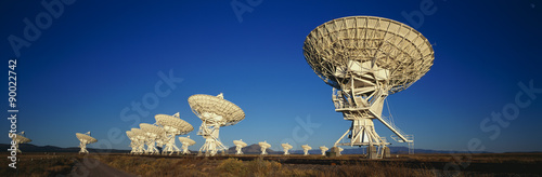 This is the Very Large Array or VLA at the National Radio Astronomy Observatory. It represents communication. photo