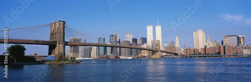 This is the Brooklyn Bridge over the East River with the Manhattan skyline.