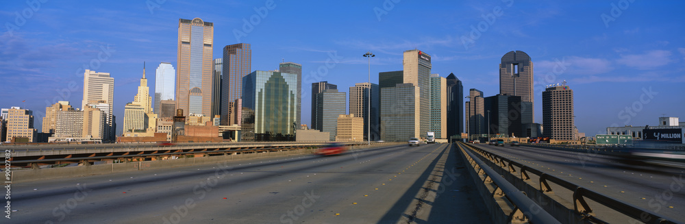 This is the freeway to the center of the city with the skyline in the background. The Chase Tower is the building in the center.