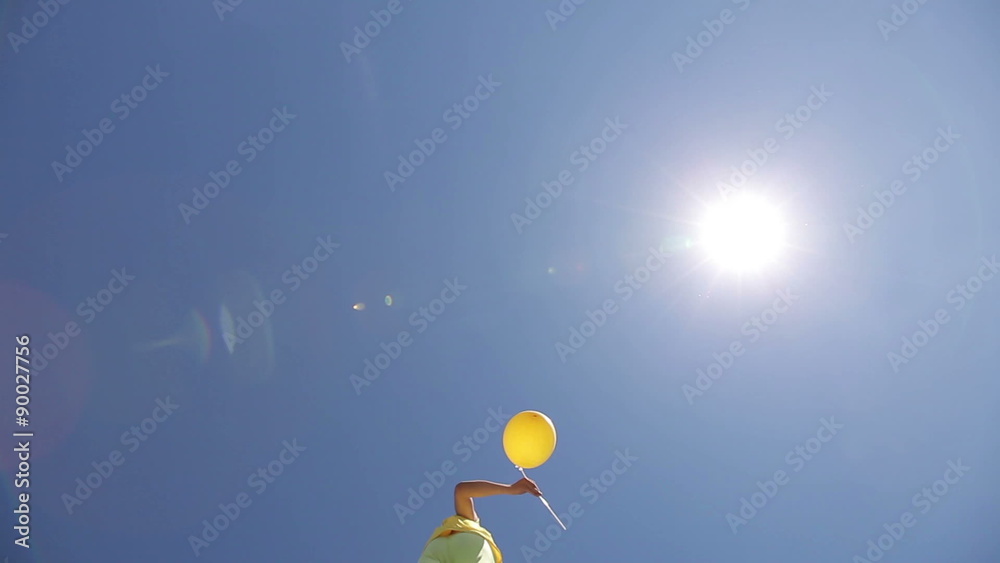 Two smiling men on stilts step over the camera Two smiling men on stilts step over the camera