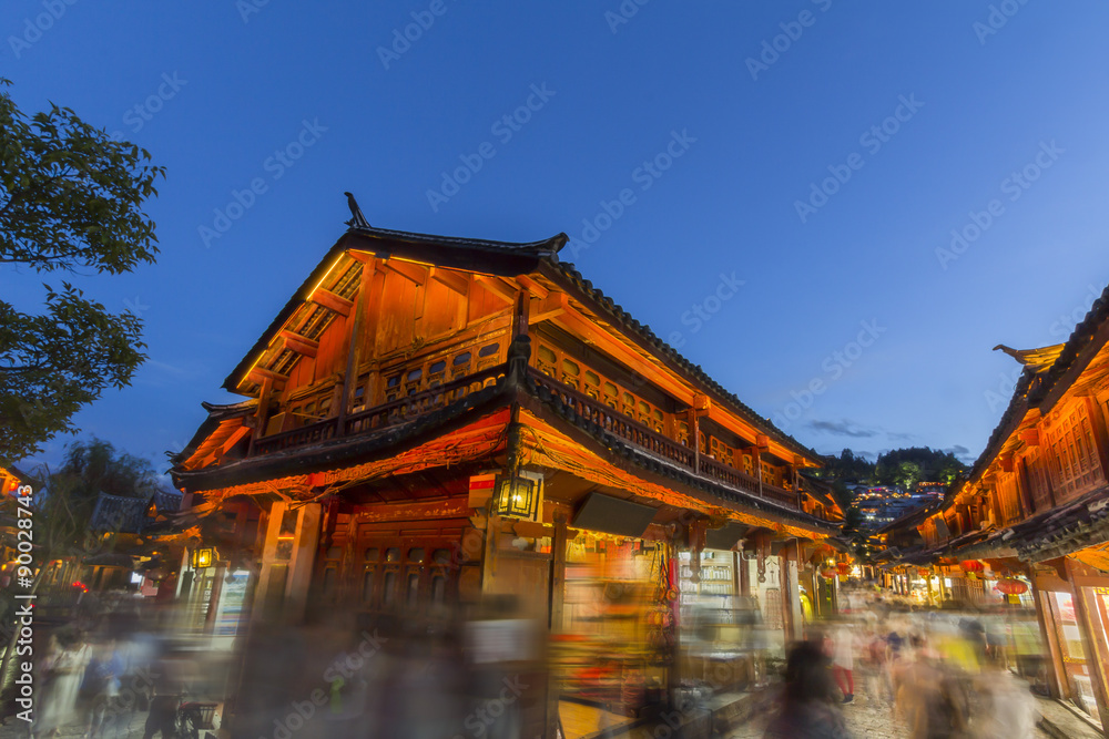 Lijiang old town in the evening with crowd tourist. Lijiang old town in the evening with crowd tourist.