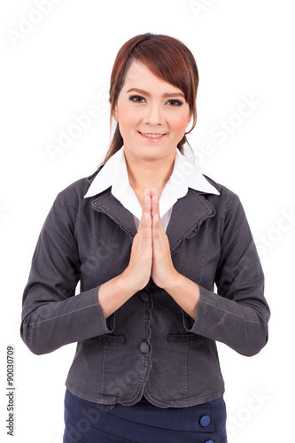 Business Woman portrait in a welcome pose. thai style sawadee photo