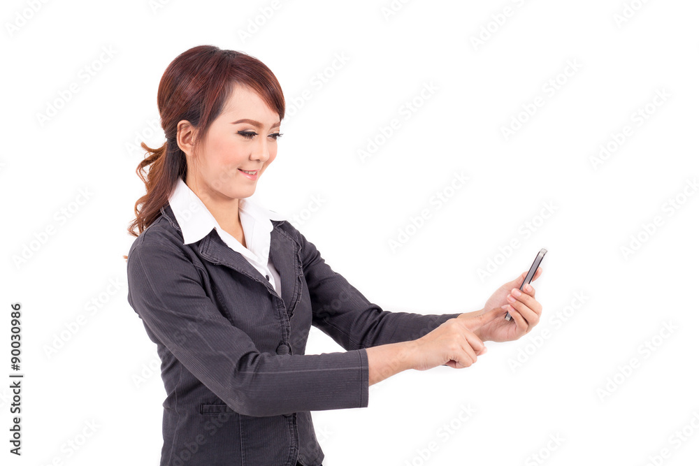 Young business woman holding and look at smartphone on white background Young business woman holding and look at smartphone on white background