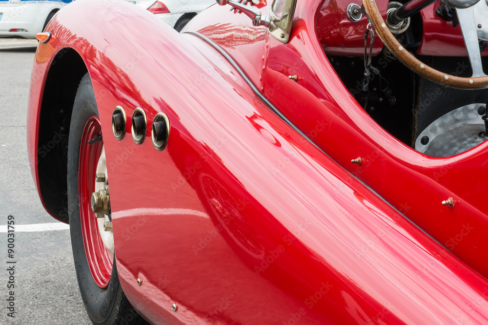 Side Exhaust Pipe Coming Out from Red Vintage Car