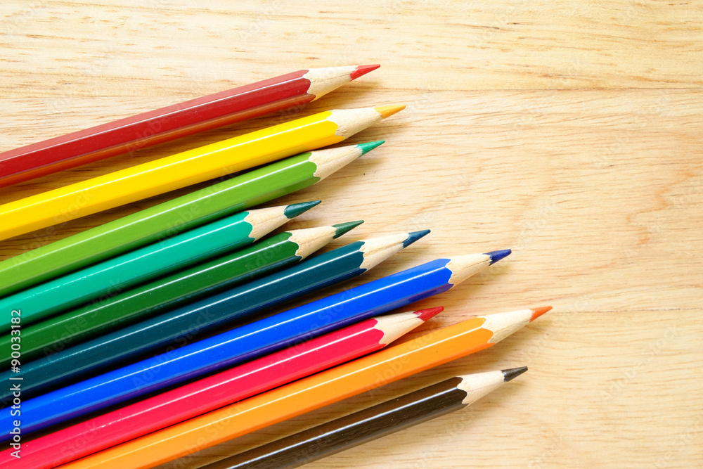 Color pencils on wood background Color pencils on wood background