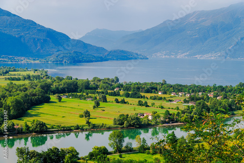 Lago di Mezzola Lake landscape. Water and mountains. Lombardy  Italy  Europe. 