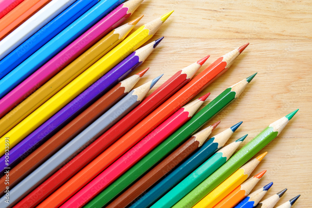 Color pencils on wood background Color pencils on wood background