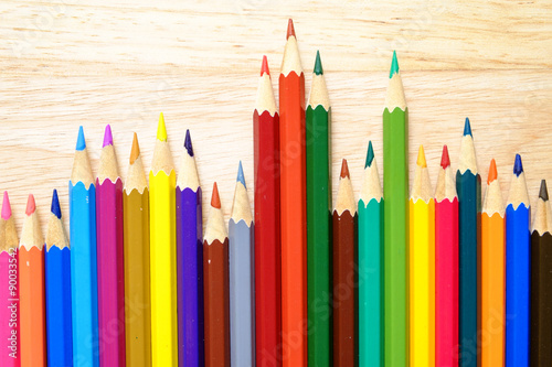 Color pencils on wood background