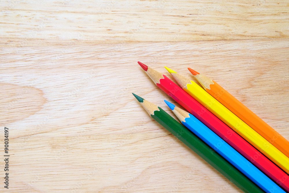 Color pencils on wood background Color pencils on wood background