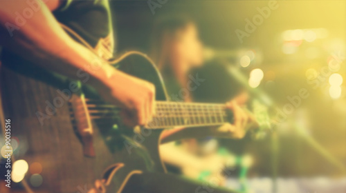 Guitarist on stage for background, soft and blur concept, Vintage tone