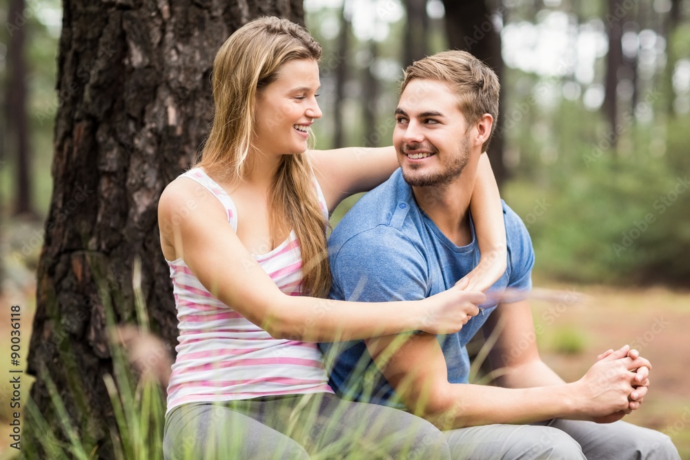 Young happy hiker couple looking at each other Young happy hiker couple looking at each other