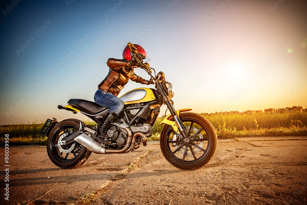 Biker girl on a motorcycle