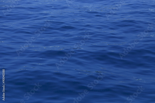 Fototapeta Naklejka Na Ścianę i Meble -  Smoothly water Waves. /Detail photo of smooth, soothing blue water. 