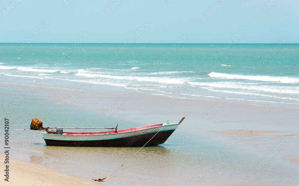 Naklejka premium a boat on the beach
