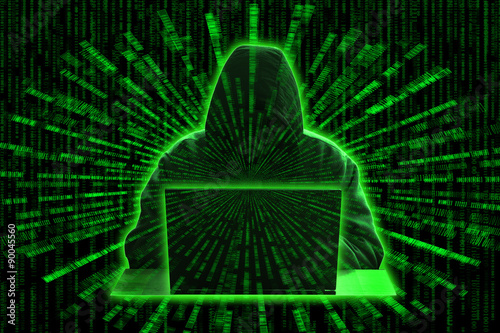 Conceptual image of a hacker on green matrix background