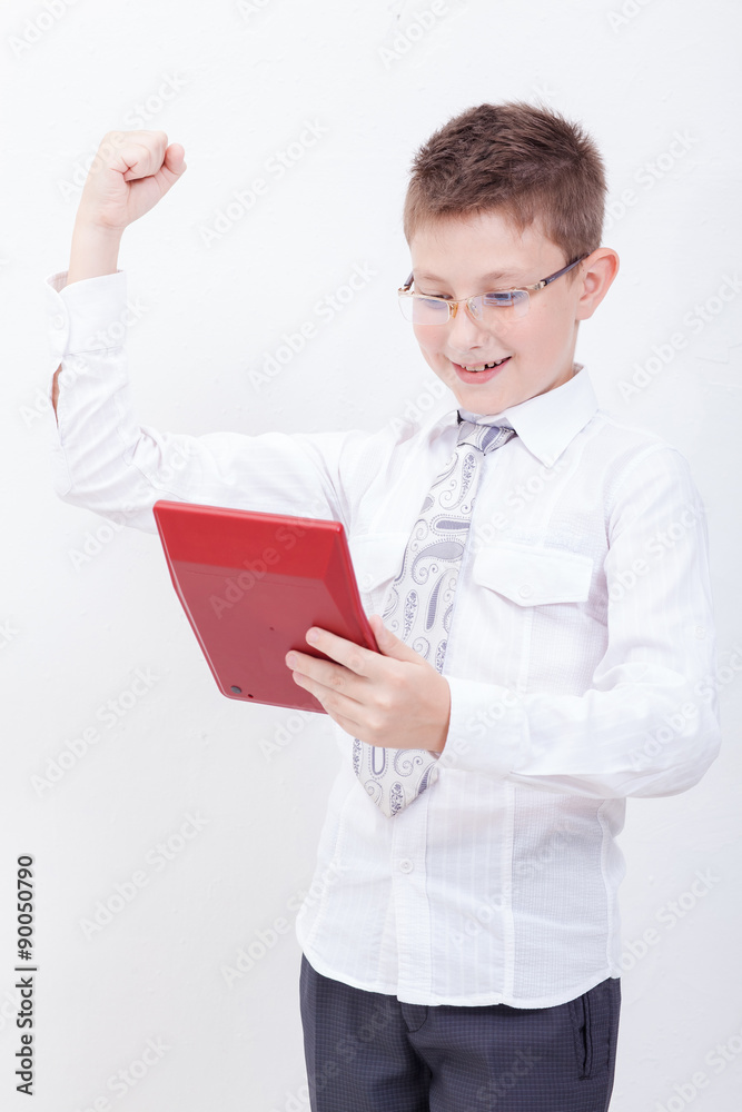 Portrait of teen boy with calculator on white background Portrait of teen boy with calculator on white background