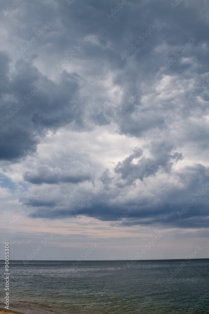 Vertical storm seascape with cloudy sky Vertical storm seascape with cloudy sky