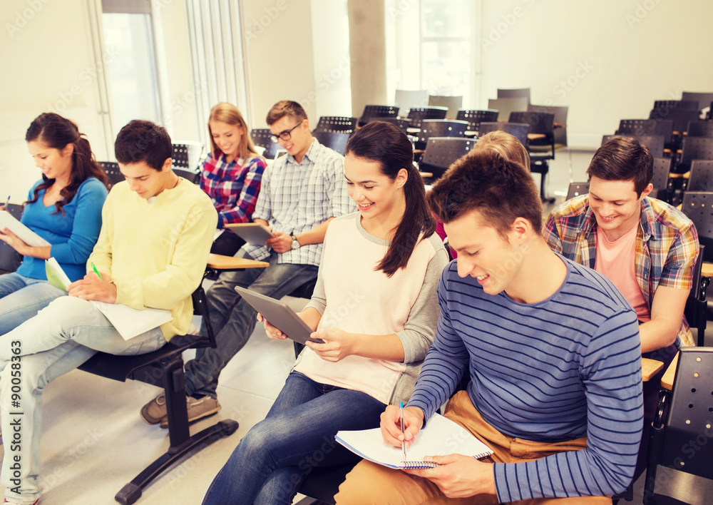 group of smiling students with tablet pc group of smiling students with tablet pc