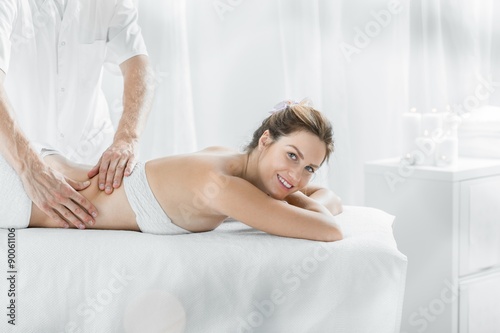 Modern female in massage salon