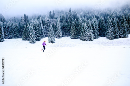 Woman running in winter, fitness inspiration and motivation