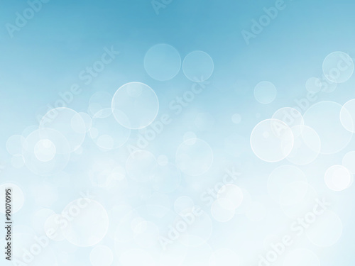 abstract blue background with bokeh effect © BazziBa