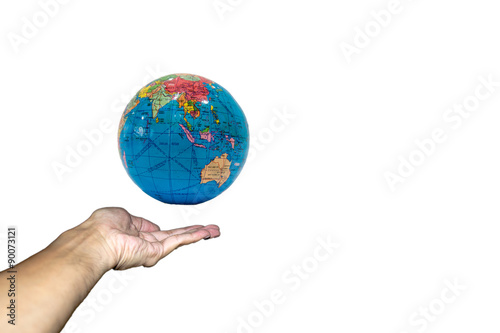 Fototapeta Naklejka Na Ścianę i Meble -  Hand holding globe model on white background.