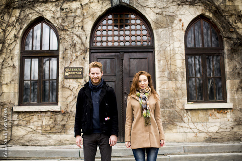 Young red hair couple at outdoors